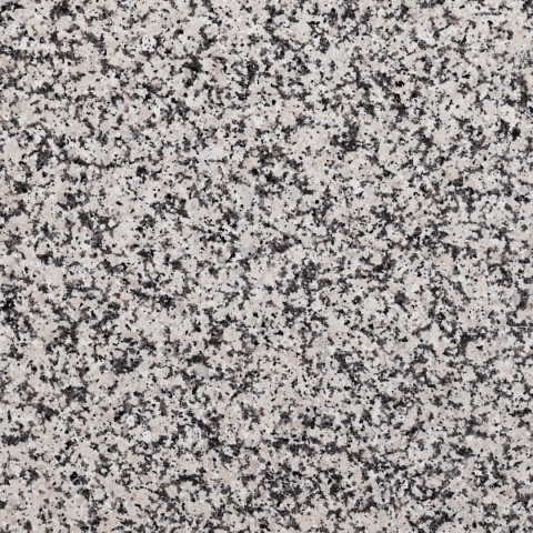 Struktura granitu Crema FALCO – jasny kamień o delikatnym wzorze i naturalnej powierzchni polerowanej