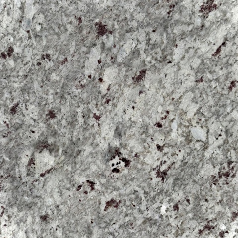 Granit Moon White FALCO – jasny kamień z delikatnym wzorem i drobnymi, bordowymi akcentami, elegancka faktura