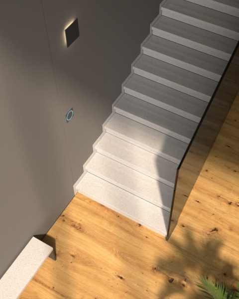 Nowoczesne białe schody z aglomarmuru Bianco Micro w jasnym wnętrzu z drewnianą podłogą