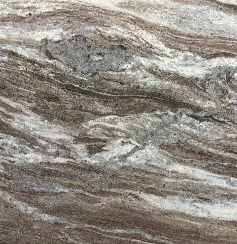 Zbliżenie struktury marmuru Fantasy Brown polerowanego z dynamicznym rysunkiem w odcieniach beżu brązu i szarości