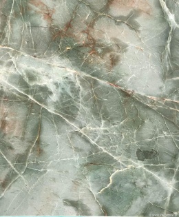 Zbliżenie struktury kwarcytu Jadore Green – zielone tony i złoto-rdzawe żyły