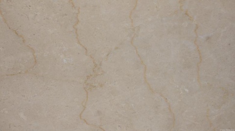 Zbliżenie powierzchni marmuru Botticino, ciepły beż z subtelnymi żyłkami i drobną, naturalną strukturą