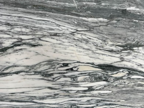 Marmur Fantastico Grey, białe tło z dynamicznymi szarymi i grafitowymi żyłami, efekt falującego rysunku.