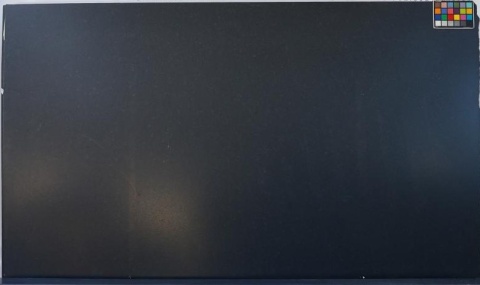 Granit Zimbabwe Dark szczotka – płyta na tle ekspozycji, matowo-satynowe wykończenie; wzornik kolorów.