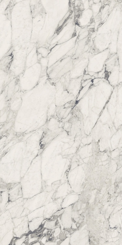 Spiek kwarcowy Marazzi Marble Look Calacatta Extra – biała powierzchnia z szarym marmurowym rysunkiem.