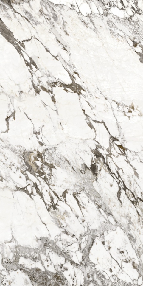Spiek kwarcowy Marazzi Marble Look Capraia Faccia A Lux – jasny marmur z szaro-grafitowym użyleniem.