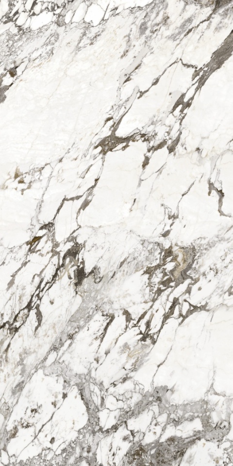 Marazzi Marble Look Capraia Faccia B Lux – białe marmurowe tło z wyrazistym, kontrastowym rysunkiem żył.