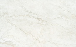 Próbka Dekton Thala w kremowo-beżowym odcieniu z subtelnymi, miękkimi przejściami tonalnymi inspirowanymi wapieniem