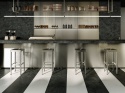 Podłoga i schody z Marazzi Infinity Anthracite, ciemny kamień w eleganckiej, nowoczesnej aranżacji