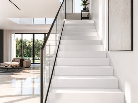 Nowoczesne schody z Avant Quartz 1004 White Quartz w polerze, biała powierzchnia i szklana balustrada