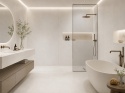 Infinity RE01 Resin Total White jako wielkoformatowa okładzina ścian i blatu w łazience spa.