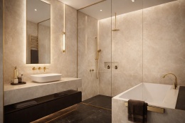 Nowoczesna łazienka ze spiekiem Diamond Cream na ścianach, ciemną podłogą i złotymi bateriami oraz elegancką zabudową.