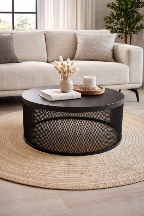 Rivela z laminowanym czarnym blatem i metalową podstawą w eleganckim salonie
