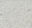 Próbka Silestone Blanco Stellar 13 z jasną bazą i drobnym mineralnym uziarnieniem
