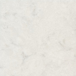 Próbka Silestone Lagoon z jasną kremowo-beżową bazą, drobną strukturą i subtelnym użyleniem