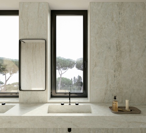 Łazienka z umywalką i okładziną z Dekton Nara w wykończeniu velvet