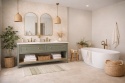 Łazienka boho z dekoracyjną ścianą z Dekton Thala w kremowo-beżowym odcieniu i zielonymi akcentami