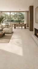 Jasny salon z jadalnią i podłogą Grespania Porfido Sand Natural 10,5 mm w ciepłej aranżacji.