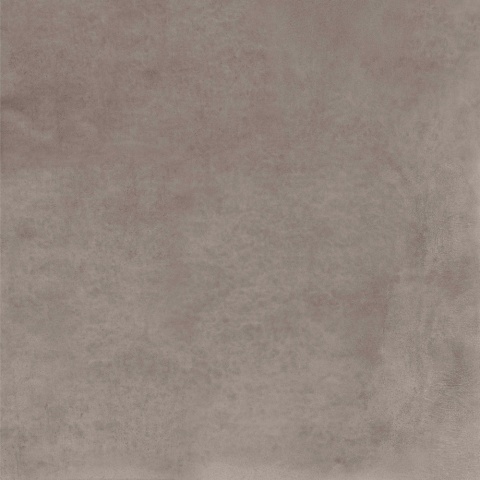 Marazzi Concrete Look Mud z ciepłą szaro-brązową bazą i subtelnymi przetarciami inspirowanymi betonem