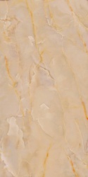 Marazzi Onice Beige z ciepłą beżową bazą, półtransparentnym rysunkiem i delikatnym bursztynowym użyleniem