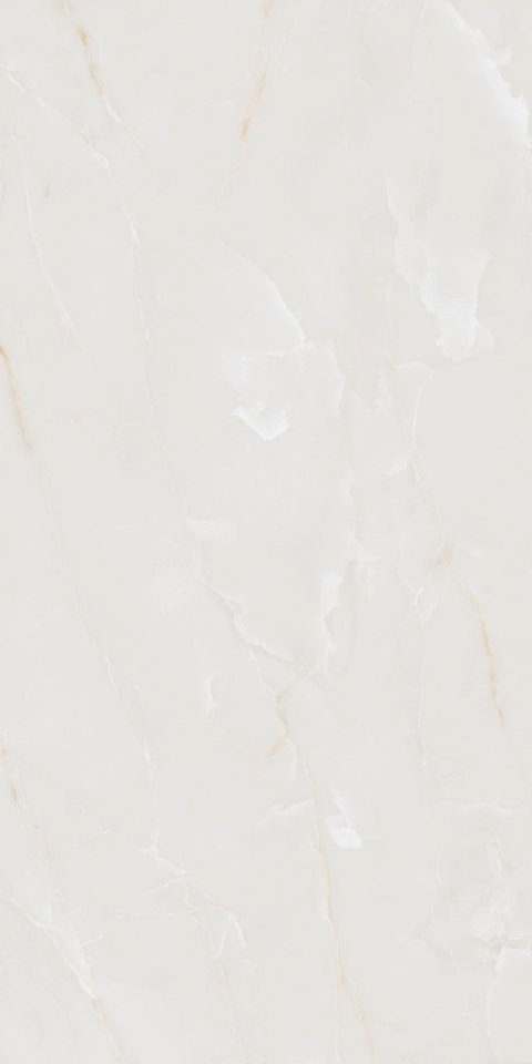 Marazzi Onice Avorio z kremową bazą, subtelnymi złotawymi żyłami i błyszczącym wykończeniem Lux