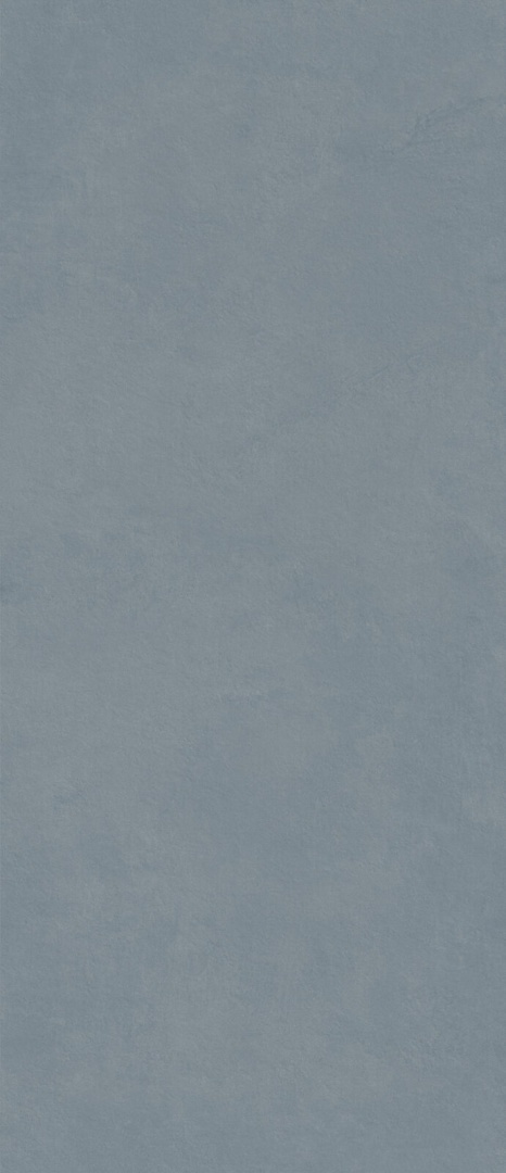 Marazzi Cementum Indigo z przygaszoną niebiesko-szarą bazą i subtelnymi cementowymi przetarciami
