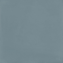 Marazzi Resin Look Azzurro z przygaszoną niebiesko-szarą bazą, delikatnymi przetarciami i subtelnymi przejściami tonalnymi