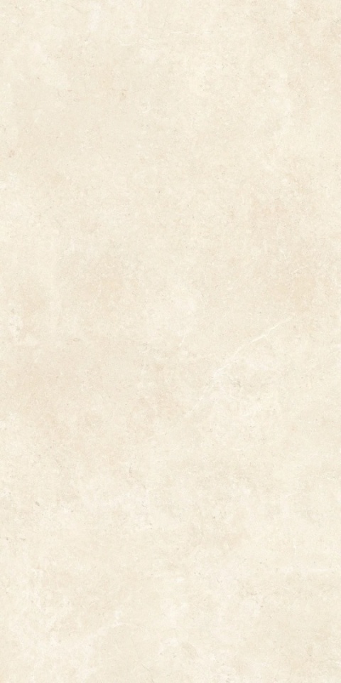 Marazzi Limestone Ivory z jasną kremowo-beżową bazą, delikatnymi chmurzeniami i subtelnym rysunkiem wapienia