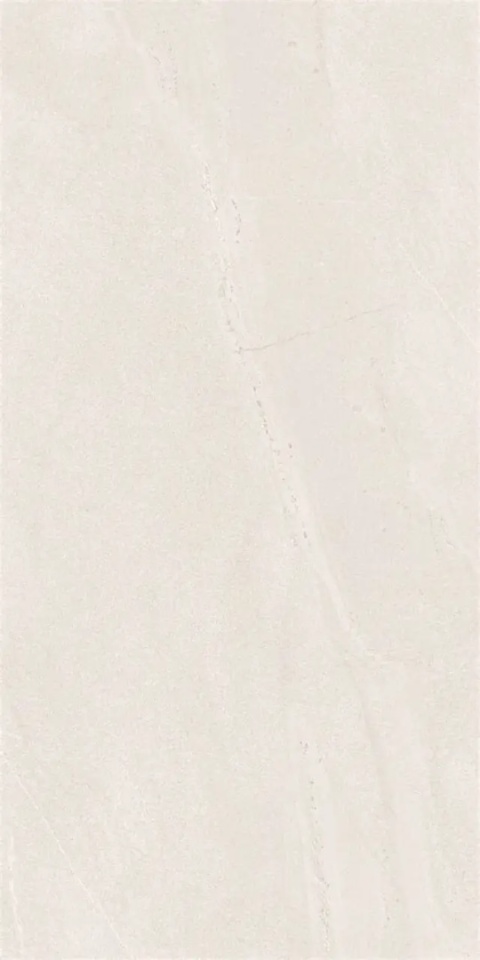 Marazzi Pietra Di Sicilia Bianco z jasną bazą w kolorze złamanej bieli, subtelnymi chmurzeniami i delikatnymi liniami kamienia