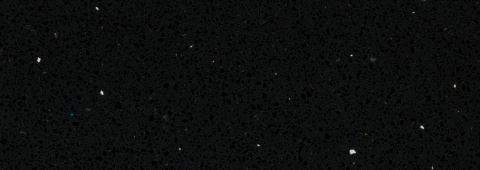 Detal TechniStone Starlight Black z czarną strukturą kwarcową i połyskującymi drobinami.