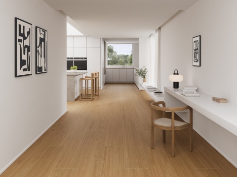 Jasne wnętrze z podłogą Neolith Pasadena Wood w ciepłym, miodowym odcieniu drewna.