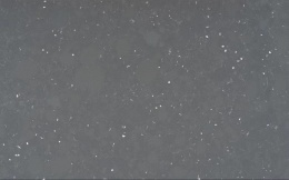 Silestone FFROM 02 – grafitowo-szara powierzchnia o mineralnym charakterze z drobnymi jasnymi wtrąceniami