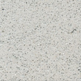 Silestone Stellar Blanco 13 w jasnej kolorystyce z gęsto rozmieszczonymi szarymi i półprzezroczystymi drobinami