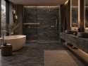 Elegancka łazienka z ciemnym spiekiem FLORIM Stone Stone Noir, wanną i ciepłym oświetleniem.