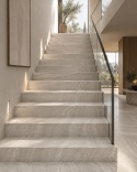 Nowoczesne schody wykończone FLORIM Stone Travertine Nut 20 mm Matte Silk.
