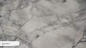 Zbliżenie powierzchni kwarcytu Super White z białymi i szarymi strukturami mineralnymi.