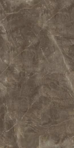 Powierzchnia FLORIM Stone Stone Brown z naturalnym kamiennym rysunkiem i subtelnym jasnym użyleniem.