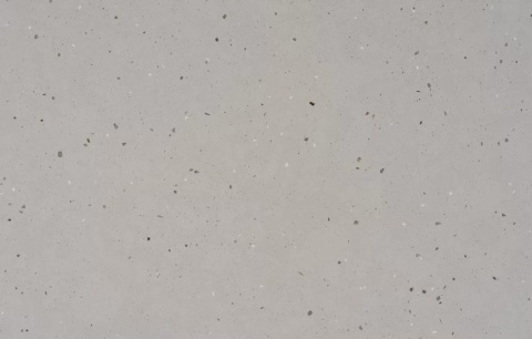 Silestone Concrete Pulse przedstawiająca jasnoszarą kolorystykę z dekoracyjnymi ziarnami