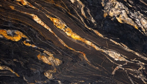 Cosmic Gold szczotkowany 20 i 30 mm – ciemny granit ze złotymi, kremowymi i brązowymi pasmami.