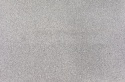 Gris Messi poler 20 i 30 mm – blat i wyspa kuchenna z szaro-białego granitu o drobnoziarnistym wzorze i połysku.