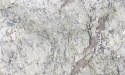 Patagonia Real Polished 30 mm – jasny granit z grafitowym użyleniem, beżowymi akcentami i nieregularnym rysunkiem.