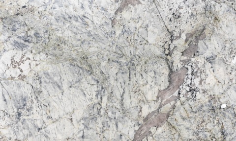 Patagonia Real Polished 30 mm – jasny granit z grafitowym użyleniem, beżowymi akcentami i nieregularnym rysunkiem.