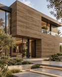 Laminam Legno Venezia Noce 3+ mm jako okładzina elewacji nowoczesnego domu z dużymi przeszkleniami.